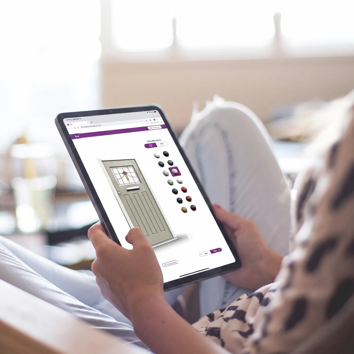 Homeowner using the Rockdoor 3D door designer on a tablet